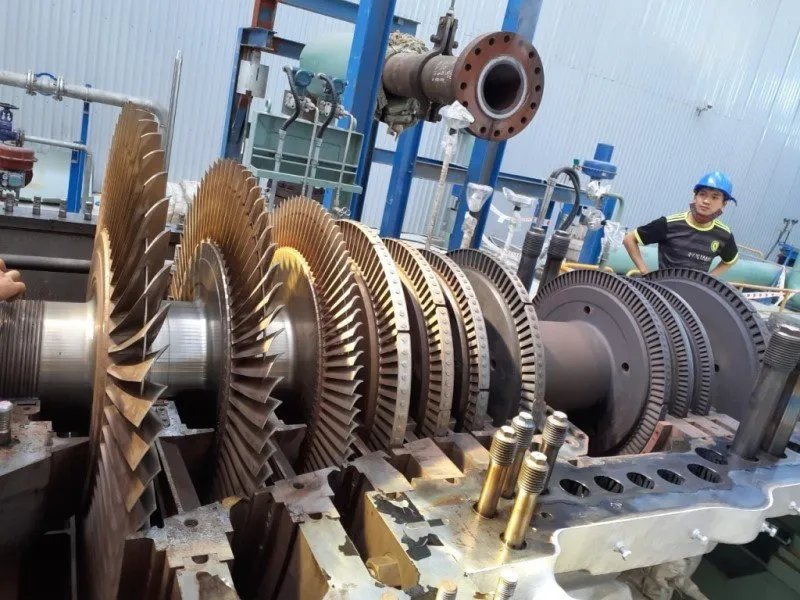 Engineers assessing a whitemetal bearing for failure analysis