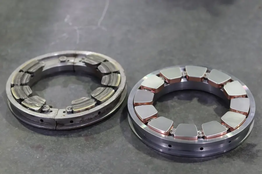 Comparison of failed and upgraded thrust bearing assemblies