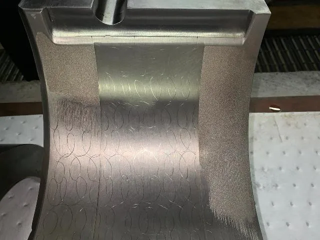 Electrical discharge pitting in a whitemetal bearing lining
