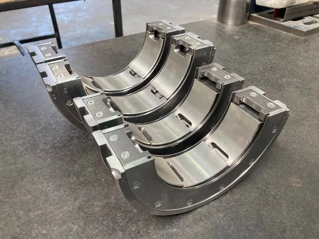 Tilting-pad steam turbine journal bearing used for rotordynamic stiffness and damping analysis